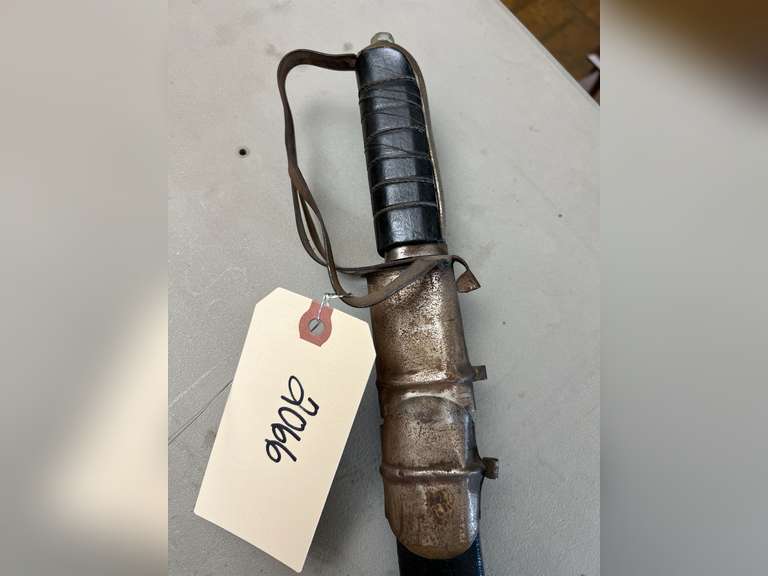 Sword in sheath, 36” long.