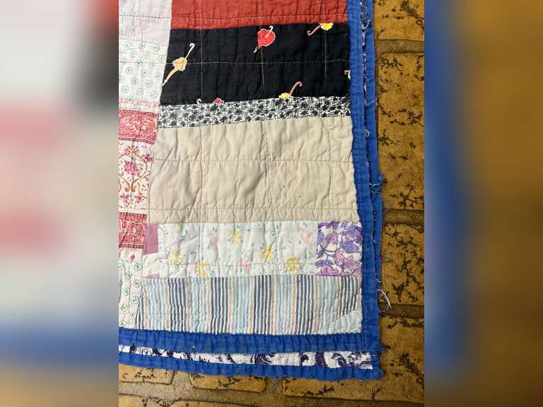 Vintage quilt with feather pillow. Quilt is 82” x 76”.
