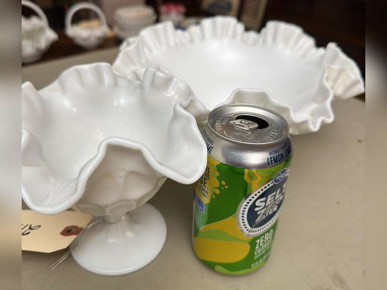 Two, ruffled edge glass pieces