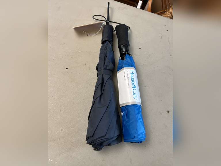 2 Folding umbrellas.