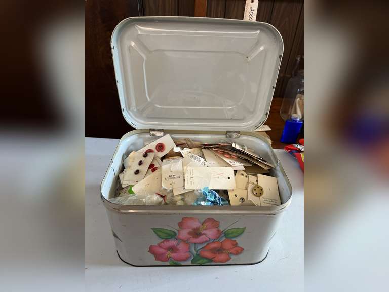 Bread box full of buttons.