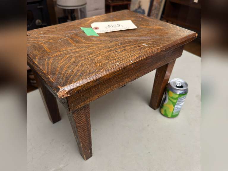 Tucker Oakwood stool, 10 1/2 half inches tall by 15 inches wide by 10 1/2 inches deep