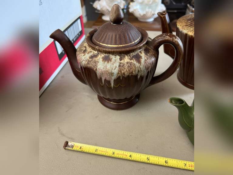 2 Brown Drip glaze tea pots, 1 mini green teapot and 1 decorative pitcher.