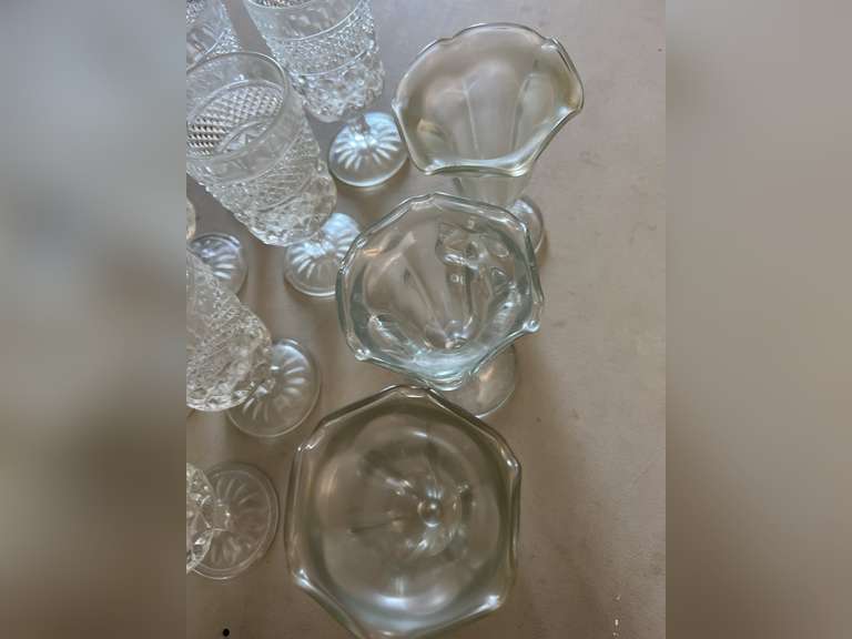 8 Heavy stemmed drinking glasses and 3 sundae glasses.