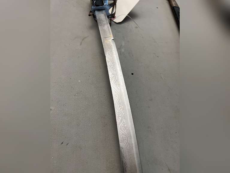 Sword in sheath, 36” long.