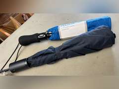 2 Folding umbrellas.
