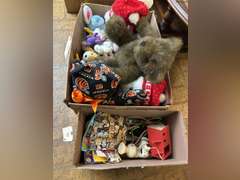 Two boxes with stuffed animals and kids toys