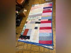 Vintage quilt with feather pillow. Quilt is 82” x 76”.