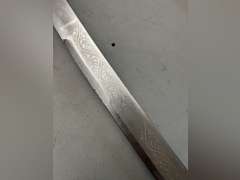 Sword in sheath, 36” long.