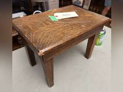 Tucker Oakwood stool, 10 1/2 half inches tall by 15 inches wide by 10 1/2 inches deep