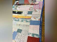 Vintage quilt with feather pillow. Quilt is 82” x 76”.