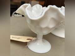 Two, ruffled edge glass pieces