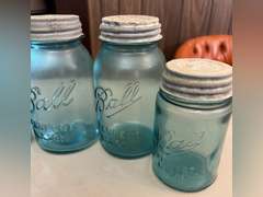 Blue Ball jars with metal caps and 1 clear Mason jar, no lid.