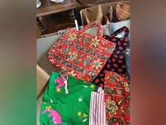 Fabric bags, plate storage covers and holiday vests.