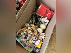 Two boxes with stuffed animals and kids toys
