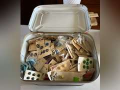 Bread box full of buttons.