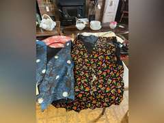 Fabric bags, plate storage covers and holiday vests.