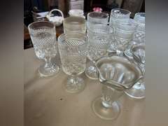 8 Heavy stemmed drinking glasses and 3 sundae glasses.