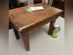 Tucker Oakwood stool, 10 1/2 half inches tall by 15 inches wide by 10 1/2 inches deep