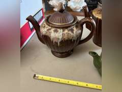 2 Brown Drip glaze tea pots, 1 mini green teapot and 1 decorative pitcher.
