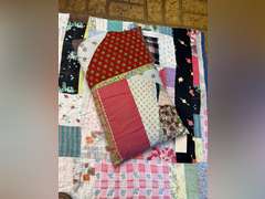 Vintage quilt with feather pillow. Quilt is 82” x 76”.