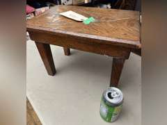 Tucker Oakwood stool, 10 1/2 half inches tall by 15 inches wide by 10 1/2 inches deep
