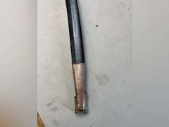 Sword in sheath, 36” long.