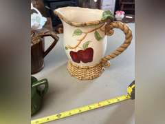 2 Brown Drip glaze tea pots, 1 mini green teapot and 1 decorative pitcher.