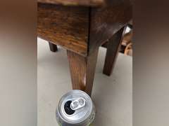 Tucker Oakwood stool, 10 1/2 half inches tall by 15 inches wide by 10 1/2 inches deep