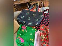 Fabric bags, plate storage covers and holiday vests.