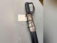 Sword in sheath, 36” long.