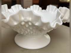 Two, ruffled edge glass pieces