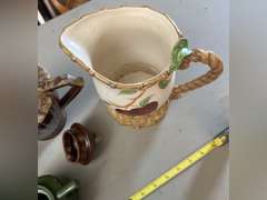 2 Brown Drip glaze tea pots, 1 mini green teapot and 1 decorative pitcher.