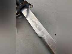 Sword in sheath, 36” long.