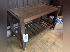 Rolling table, 20 1/2 inches tall by 31 1/2 inches wide by 15 1/4 inches deep