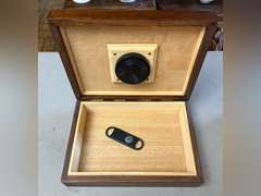 Humidor and cutter. Box is 8“ x 11“ x 3“.