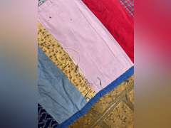 Vintage quilt with feather pillow. Quilt is 82” x 76”.