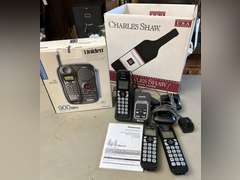 Unidentified cordless telephone in unopened box and Panasonic Link2Cell Cordless phone w/answering machine and 2 additional handsets.