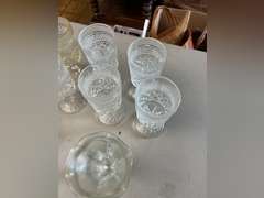 8 Heavy stemmed drinking glasses and 3 sundae glasses.