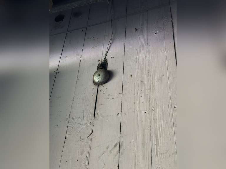 Performers stage bell located on wall in basement. Buyer must remove from the wall at approx 10' height.