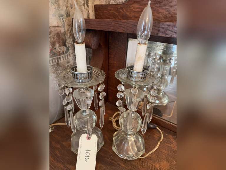 Pair of crystal prism electric lamps with candle bulbs.