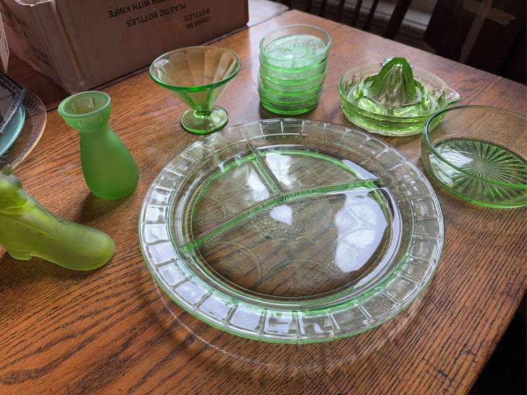 Several pieces of green uranium glass and other green glassware