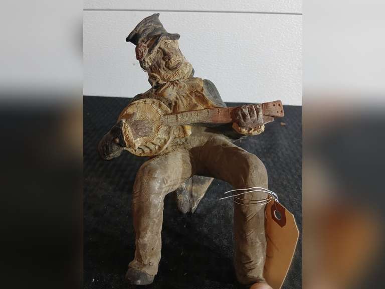 Figurine Playing Banjo