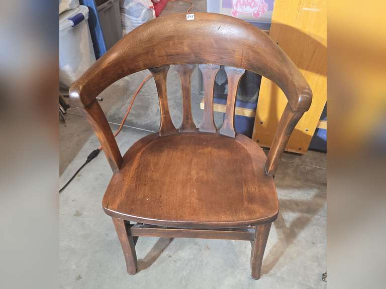 Antique office chair on metal casters
