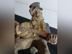 Figurine Playing Banjo