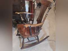 Antique pressed wood rocking chair
