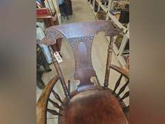 Antique pressed wood rocking chair