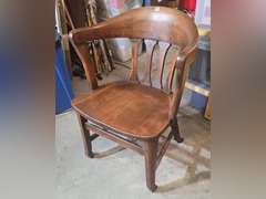 Antique office chair on metal casters