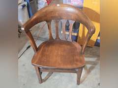 Antique office chair on metal casters