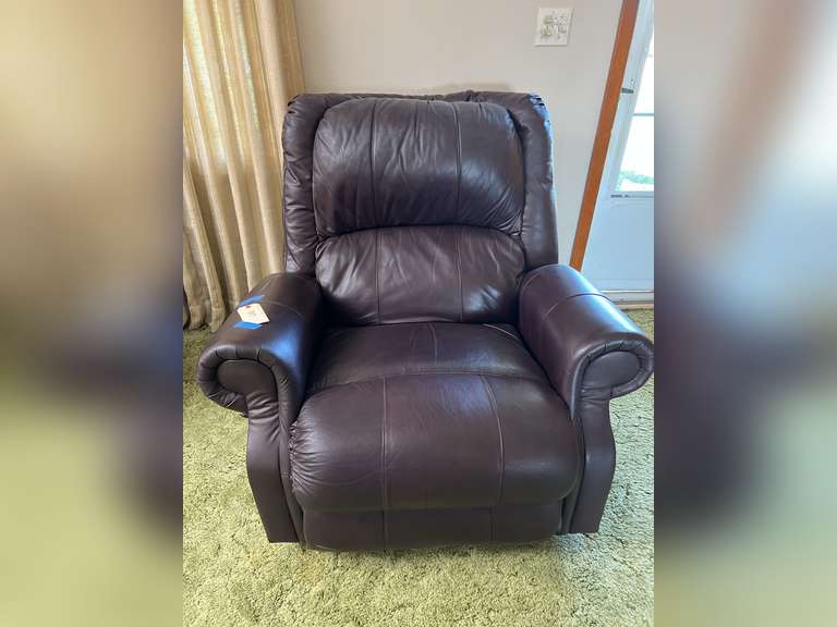 Leather or leather like rocker/recliner. See tag for dimensions.